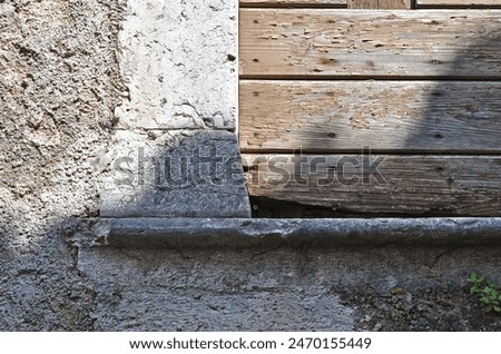 Close Up of Old Window Lintel with Rough Stone Wall 