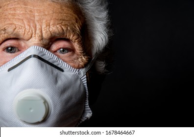 Close Up Of An Old Woman Wearing A  Mask Against Virus