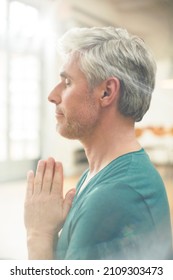 Close Up Of Older Man Meditating