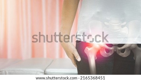 Close up older woman suffering from hip pain, health problem and people concept	