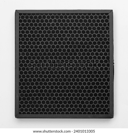 Close up on Activated Carbon in Air purifier Filter. Air Pollution. Filter for bad smell, musty smell. Filter for gas cleaning absorbs various gaseous pollutants such as formaldehyde.