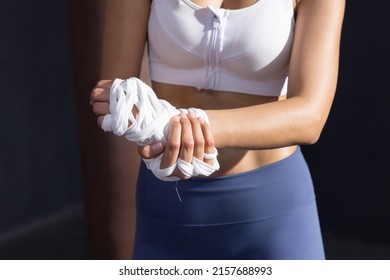 Close Up On Asian Female Boxer Grab Her Wrist With Pain From Her Wrist Injury