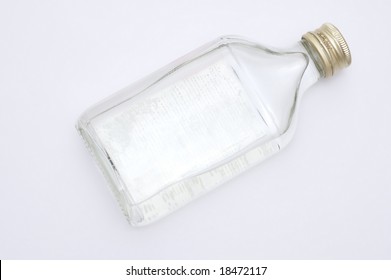 A Close Up On A Bottle Isolated On A White Background