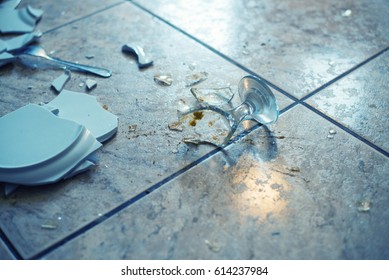 Close Up On Broken Dishes On The Floor