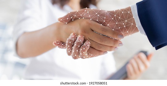 Close Up On Businesswoman Hand Shaking With Robotic AI Hologram To Confirm And Dealing For B2b Business Metaverse And Future Technology Innovation Of RPA Concept	