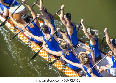 Close - Up On A Canoe Team During A Regatta