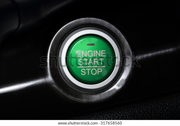close up on a car start
button