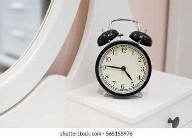Close up on clock standing on a table