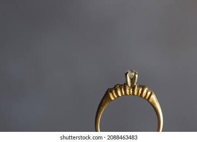 Close Up On Diamond Ring On Dark Back Drop