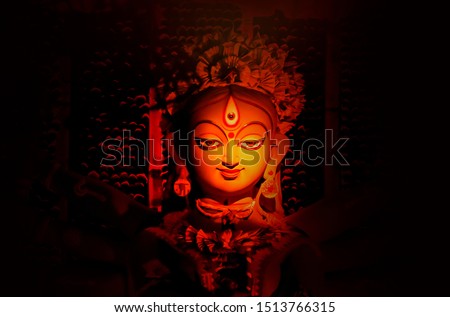 A close up on the face of an idol of Goddess Durga, symbol of strength and intensity as per Hinduism. This portrait was clicked before the Durga Puja celebrations at a potter's studio in Kolkata.