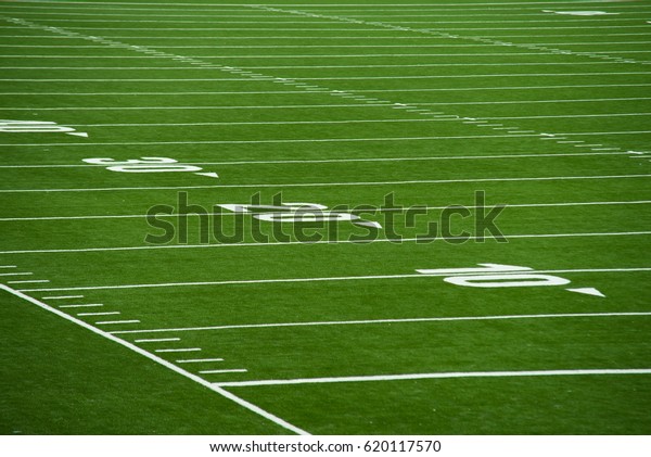Close up on football pitch -\
yards