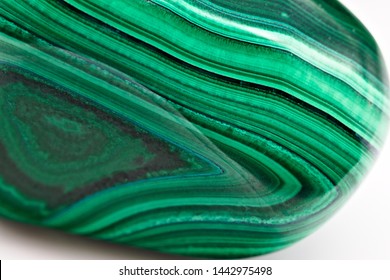 Close Up On Green Polished Shiny Malachite Stone Sample Isolated On White Limbo Background