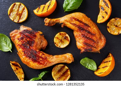 Close Up On Grilled Chicken Leg Quarters, Flat Lay