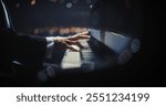 Close Up on Hands of a Talented Anonymous Pianist Making a Masterful Performance on a Grand Piano. Under Soft Stage Lights, His Fingers Move Across the Keys, Creating Beautiful Classical Music