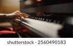 Close Up on Hands of a Talented Anonymous Pianist Making a Masterful Performance on a Grand Piano. Under Soft Stage Lights, Female Fingers Move Across the Keys, Creating Beautiful Classical Music