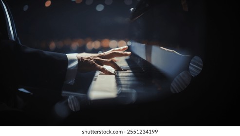 Close Up on Hands of a Talented Anonymous Pianist Making a Masterful Performance on a Grand Piano. Under Soft Stage Lights, His Fingers Move Across the Keys, Creating Beautiful Classical Music - Powered by Shutterstock