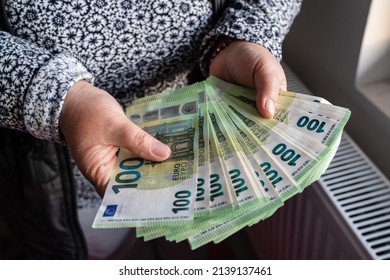 Close Up On Hands Of Unknown Caucasian Senior Woman Holding And Counting 100 Euro Banknotes Money Wealth Insurance Payment Or Lifetime Savings Copy Space