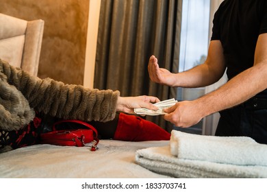 Close Up On Hands Of Unknown Man And Woman Handing The Money - Female Giving US Dollars To Pimp At Hotel Room