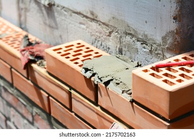 Close Up On House Constuction Wall With Ceramic  Bricks. 