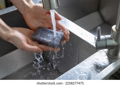 Close up on hygienic hand washing - Shutterstock ID 2258277475