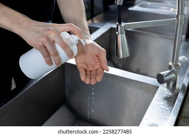 Close up on hygienic hand washing - Shutterstock ID 2258277485