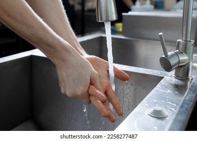 Close up on hygienic hand washing - Shutterstock ID 2258277487