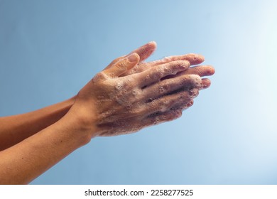 Close up on hygienic hand washing - Shutterstock ID 2258277525