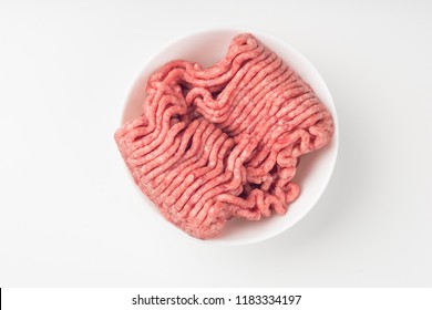 Close up on isolated bowl of lean red raw ground meat