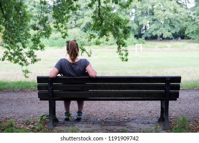 Close Up On Lonely Woman On The Bench