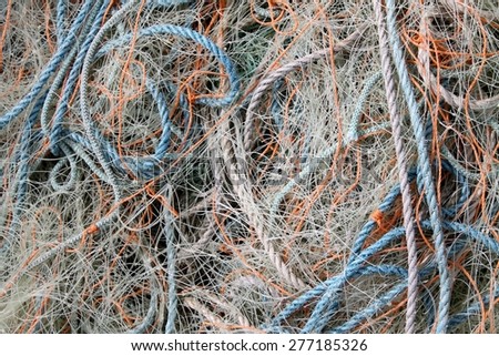 Close on mass of rope and fishing net.