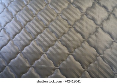 Close up on mattress surface. 