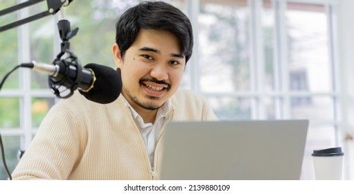 Close Up On Middle Eastern Man Talk Via Microphone Set Production On Table In The Recoding Studio For Podcast Broadcast Communication Lifestyle Concept