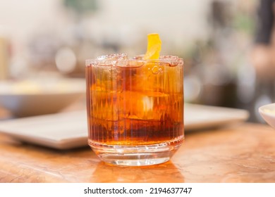 Close Up On A Mixologist Hands Preparing A Cocktail.