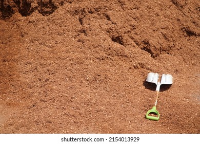 Close Up On Mulch Pile With Shovel      