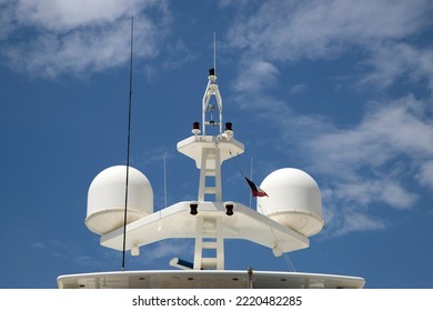 Close Up On Naval Transmission, Radio Communication Devices On A Boat, A Luxury Yacht, Including Antenna, Radio, As Well As Beacon And Radio Equipment.