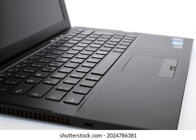 close up on notebook keyboard on white background