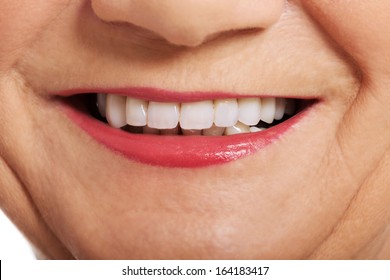 Close Up On Ol Woman's Perfect Smile, Teeth. Over White. 