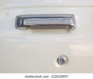 Close Up On An Old School Type Door Handle And Key Hole On A Truck With Smooth Paint Job