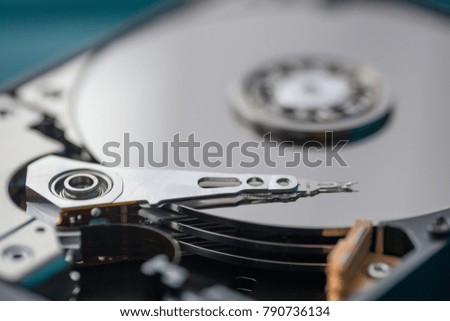 Close up on opened hard disk drive. Data recovery concept