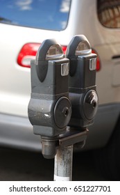 close up on parking meter at the side of street