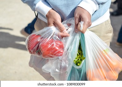 998 Man Standing Hold Plastic Bags Images, Stock Photos & Vectors ...