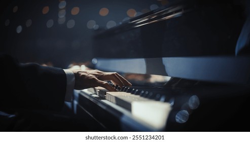 Close Up on Pianist Hands Playing a Mesmerizing Jazz Melody on a Black Grand Piano. Anonymous Artist is Focused on Creating Beautiful Instrumental Sonata as He Plays on Stage for the Audience