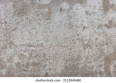 Close Up On Rough Texture Of White Surface Background On Cement Wall Outside Old Building.