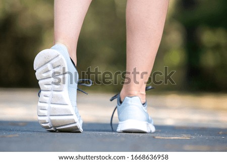 close up on running shoes fitness women training and jogging