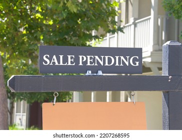 Close Up On Sale Pending Sign In Front Of A California Home. Housing Crisis, Homes For Sale.
