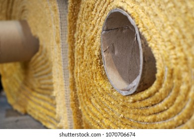 Close Up On A Stacking Thick Carpet Rolls. Wall To Wall Carpet For Office And Home Use.