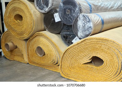 Close Up On A Stacking Thick Carpet Rolls. Wall To Wall Carpet For Office And Home Use.