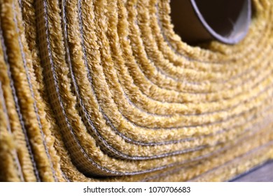 Close Up On A Stacking Thick Carpet Rolls. Wall To Wall Carpet For Office And Home Use.