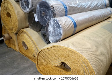 Close Up On A Stacking Thick Carpet Rolls. Wall To Wall Carpet For Office And Home Use.