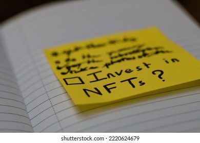 Close Up On A Sticky Note With A Todo List Stuck On A Blank Page Of A Notebook. The Highlighted Task Is To Invest In Nft, Non Fungible Token. Tilt Shift Effect